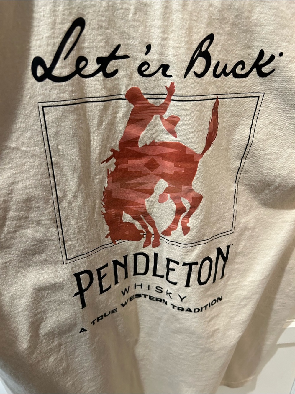 Gildan Cream Short-Sleeve Tee with Red Bucking Bronco Graphic